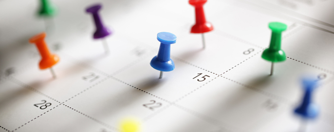 Dates are marked with pins on a calendar