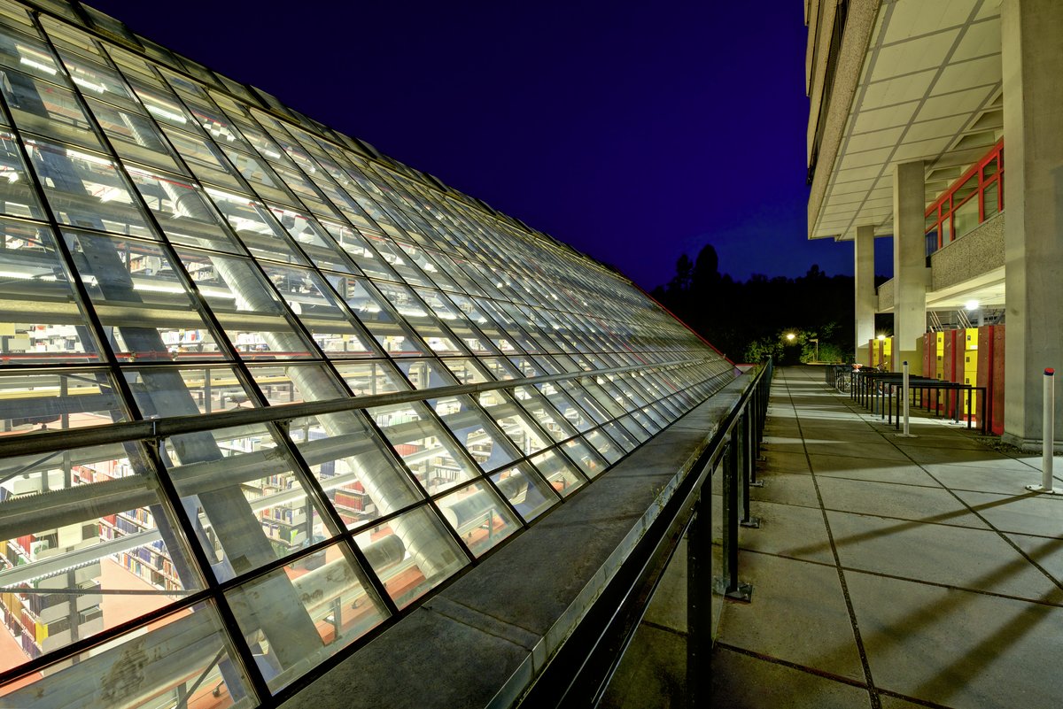 Exterior view of the J Library of the University of Konstanz at night