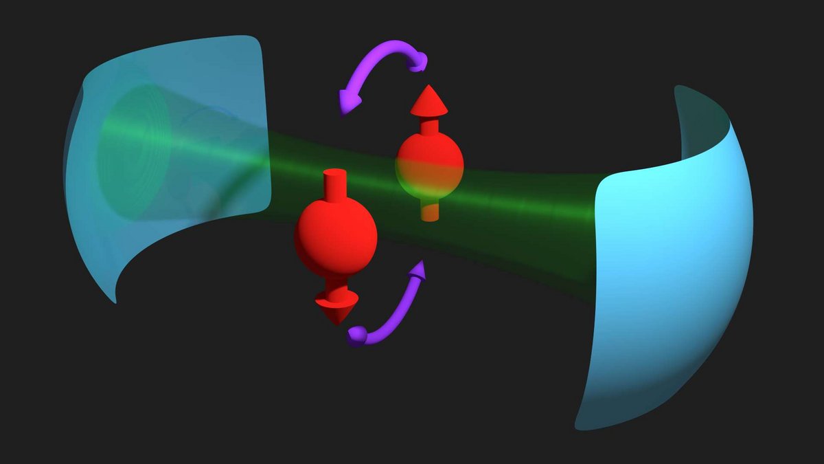 Coupling of electron spins (red) to light (green). Illustration: Dr Mónica Benito