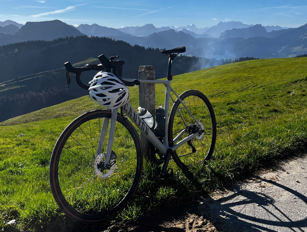 Bicycle in front of a mountain backdrop in the Swiss Alps